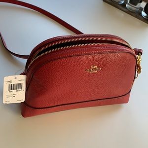 Coach handbag in rose pink leather . New